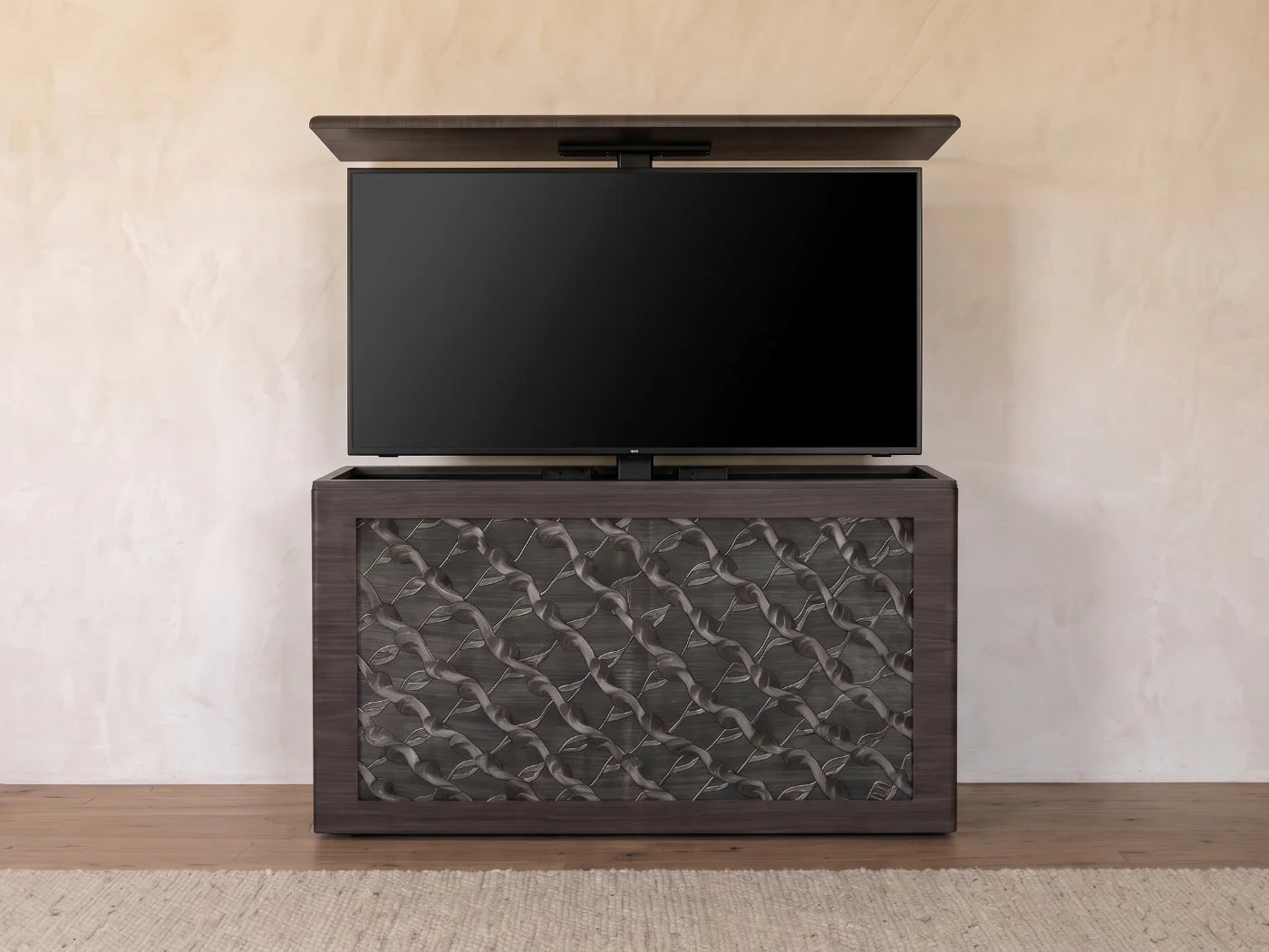 Rising: the television comes up through the top
